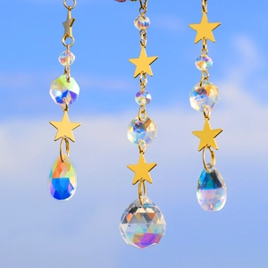 Detailed suncatcher view with golden star, iridescent crystal beads, and teardrop prisms
