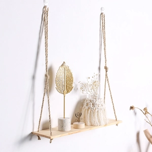 Detail of bohemian wood shelf with woven hemp rope texture on a white wall