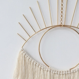 Bohemian handmade evil eye wall hanging with gold metal frame and cotton fringe tassels