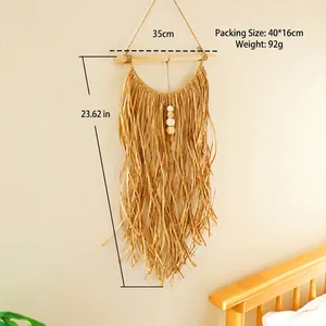 Handmade woven raffia wall hanging with wooden beads and tassels for boho home decor