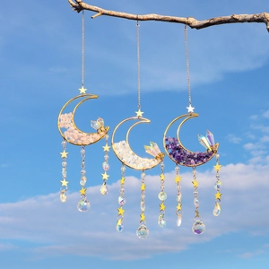Detailed trio of golden moon suncatchers with natural rose, clear and purple crystals