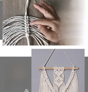 Detailed macro view of bohemian handwoven cotton macrame wall hanging with wooden rod