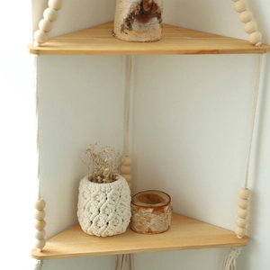 Handmade Bohemian triangular wooden corner shelf with white cotton ropes and beads