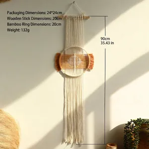 Detail of bohemian handmade cotton woven tapestry featuring a 90cm long tassel and bamboo ring