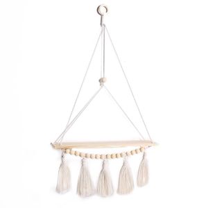 Bohemian woven wall hanging plant shelf with wood beads and cotton tassels