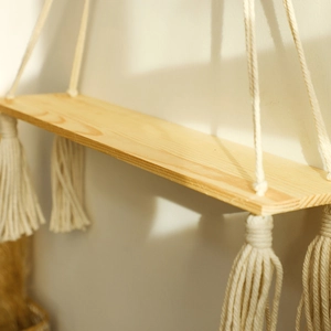 Bohemian handmade macrame wall shelf with natural wood board and fringe tassels decoration