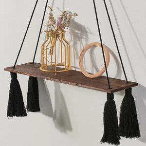 Bohemian black wood floating shelf with hanging tassels for home wall decoration