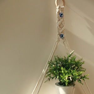 Bohemian handmade cotton plant hanger with evil eye beads for home wall decor