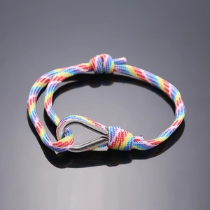 Rainbow braided friendship bracelet with polished silver nautical horseshoe clasp