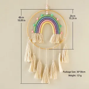 Handwoven bohemian rainbow wall hanging with colorful cotton tassels and wooden rings