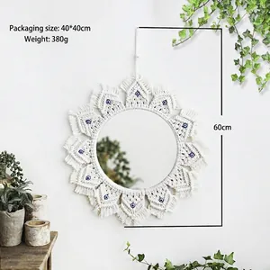 Detail of 60cm Bohemian woven mirror showing size specs and blue evil eye bead accents
