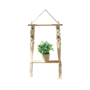 Bohemian handmade wall shelf with wood board, cotton rope and blue evil eye charms