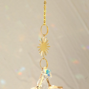Golden celestial suncatcher with star crystal and sun pendant for boho home wall decor