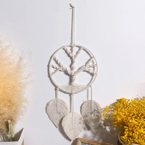 Handmade macrame wall hanging with Tree of Life design and leaf fringe tassels