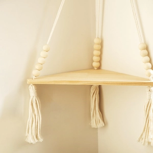 Bohemian hanging wooden corner shelf with tassels and beads for home wall decor