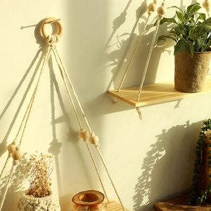 Bohemian woven macrame wall shelf with wooden board and beads for home decor