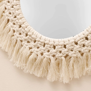 Boho handmade macrame wall mirror with cotton rope fringe and woven texture
