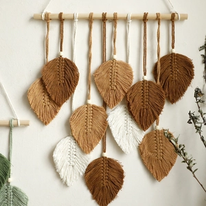 Bohemian handmade macrame wall hanging with nine woven cotton leaf tassels and wood pole