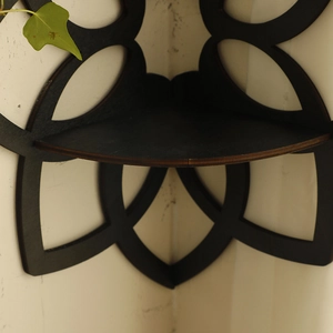 Corner wooden shelf with black lotus hollow design for rustic home wall decor