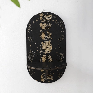 Bohemian black wooden moon phase wall shelf with gold floral patterns for crystal display