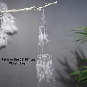 Detailed view of white feather dream catcher showing dimensions 80cm and weight 98g