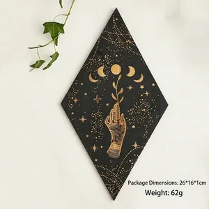 Detail showing diamond wooden wall plaque with gold celestial patterns and moon phases