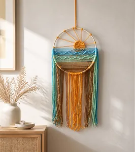 Detail of sunrise sunset macrame wall hanging with woven fringe and wooden ring