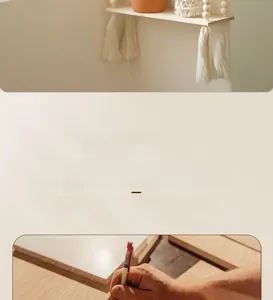 Detail of handmade wooden bead wall shelf with macrame tassels in minimalist style