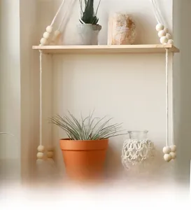 Detail of double-layer wooden shelf with cotton rope weaving and decorative wood beads
