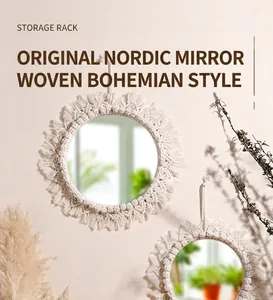 Close-up of bohemian handcrafted cotton rope weaving and fringe detail on round mirror