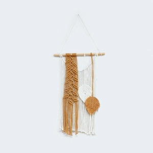 Handmade Bohemian wall hanging tapestry with cotton tassels and mustard leaf decor