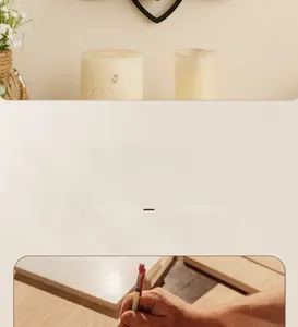 Detail showing the manual sanding process and raw solid wood texture of the lotus shelf