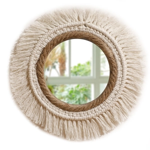Bohemian woven wall mirror with cotton fringe and hemp rope accents for living room