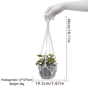 Behemian handmade macrame plant hanger with wooden beads and gray ceramic flower pot