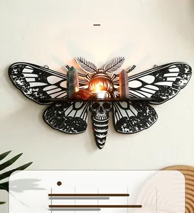 Macro detail of gothic moth skull wooden shelf with crystal and candle on a wall