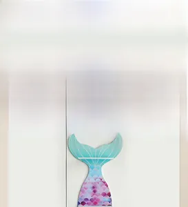 Detail view of wooden mermaid shelf showing 30cm height and blue purple scale pattern