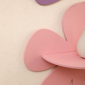 Bohemian flower shaped wooden wall shelf in pastel pink with matte finish for home decor