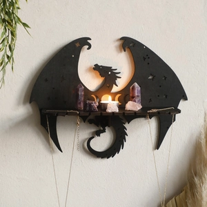 Gothic black dragon wooden wall shelf displaying crystals and candles for home decor