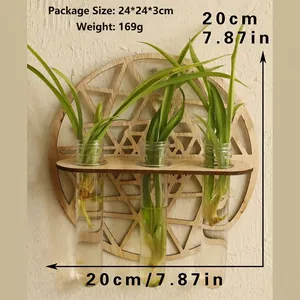 Detail of wall-mounted geometric wood plant holder with three glass hydroponic tubes