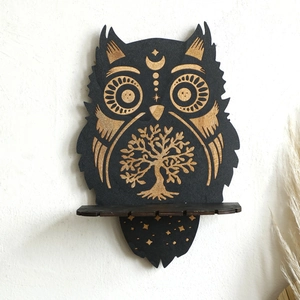 Detail of owl crystal shelf with laser-engraved tree of life and mystical lunar patterns