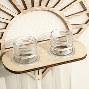 Macro detail of wooden fan-shaped wall vase with two clear glass hydroponic tubes
