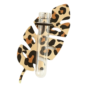 Modern leopard print monstera leaf wooden storage rack with a clear glass test tube