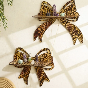 Set of two leopard print wooden bow wall shelves for home decor and crystal display