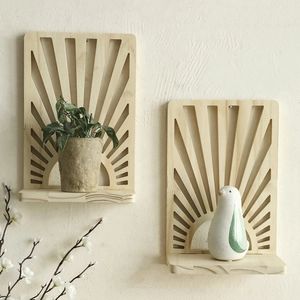 Close-up of fan-shaped cutout wooden wall shelves with natural grain for home decor