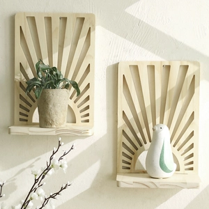 Detail of fan-shaped cutout wooden wall shelves with artistic light and shadow effects