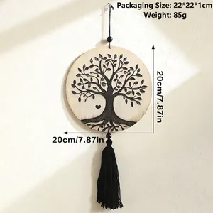 Detail view of 20cm wooden Tree of Life wall hanging with black tassels and heart charm