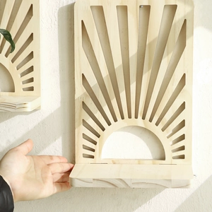 Fan-shaped hollowed wooden wall shelf with natural pine finish for home wall decor