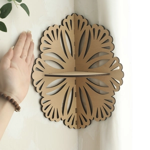 Flower shaped wooden corner shelf with laser cut petal patterns for home wall decor