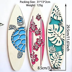 Three wooden surfboard wall decors with laser-cut sea turtle, flower, and leaf designs
