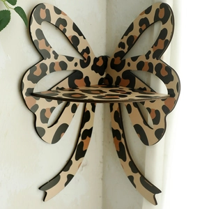 Bohemian bow-shaped corner wall shelf with leopard print design for home decor